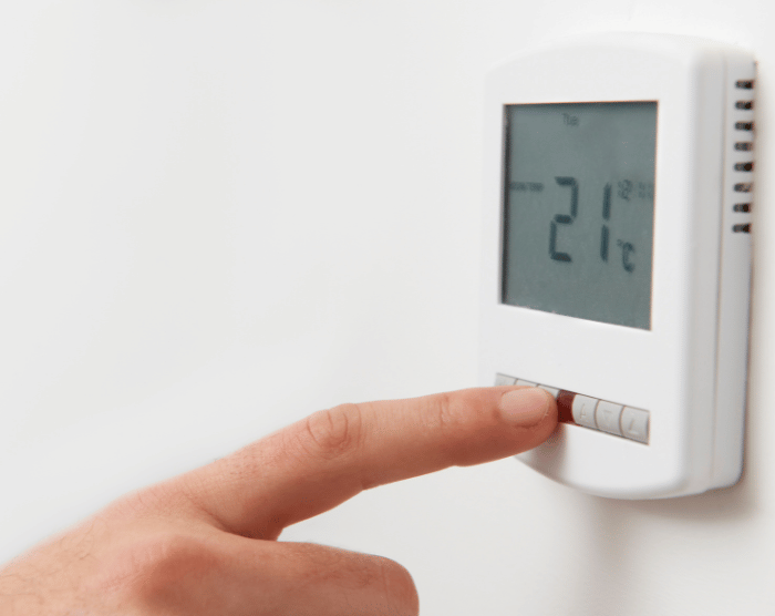 Hand adjusting thermostat for home heating